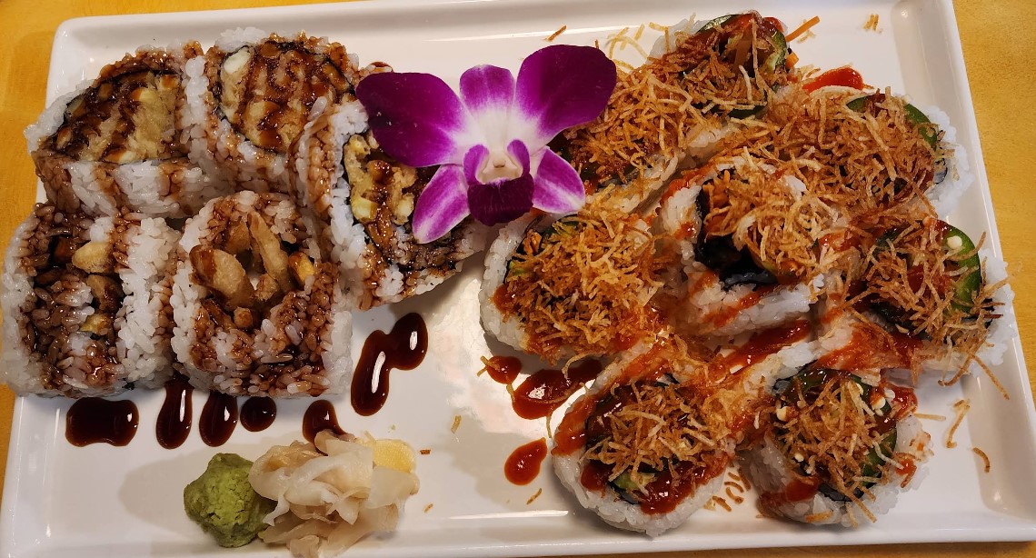 Mochi Sushi specialty rolls with purple orchid
